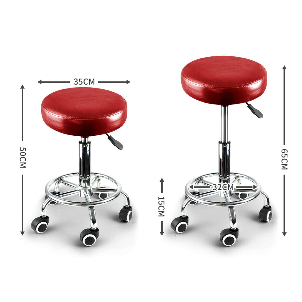 Two burgundy PU leather swivel salon stools with steel frames and rolling casters — view 2