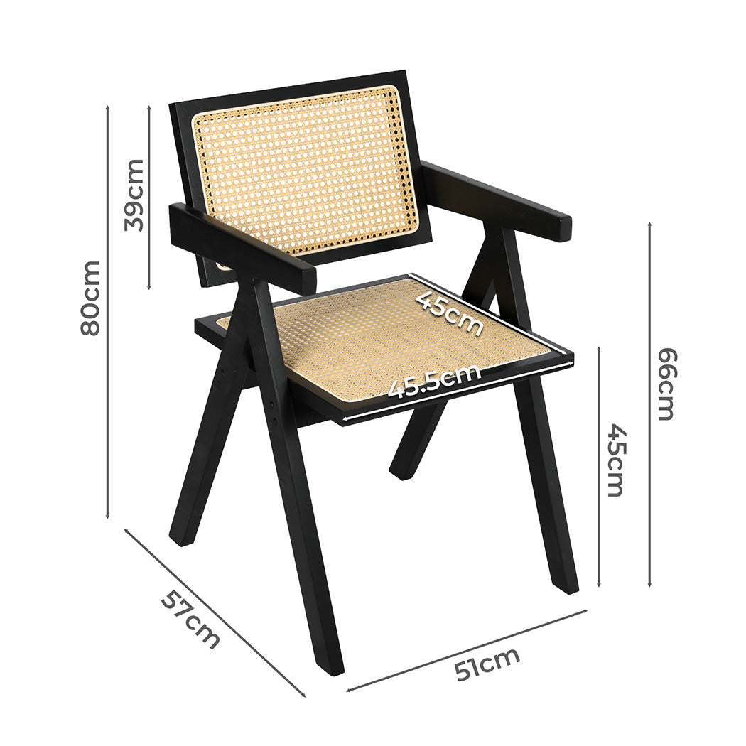 Black wicker rattan dining armchair with solid rubber wood frame and comfortable seat cushion. — view 2