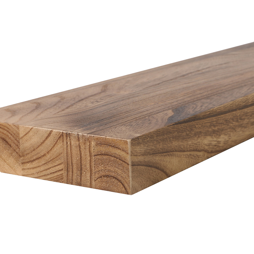 Two natural Paulownia wood floating shelves mounted on a wall displaying decorative living room items — view 3