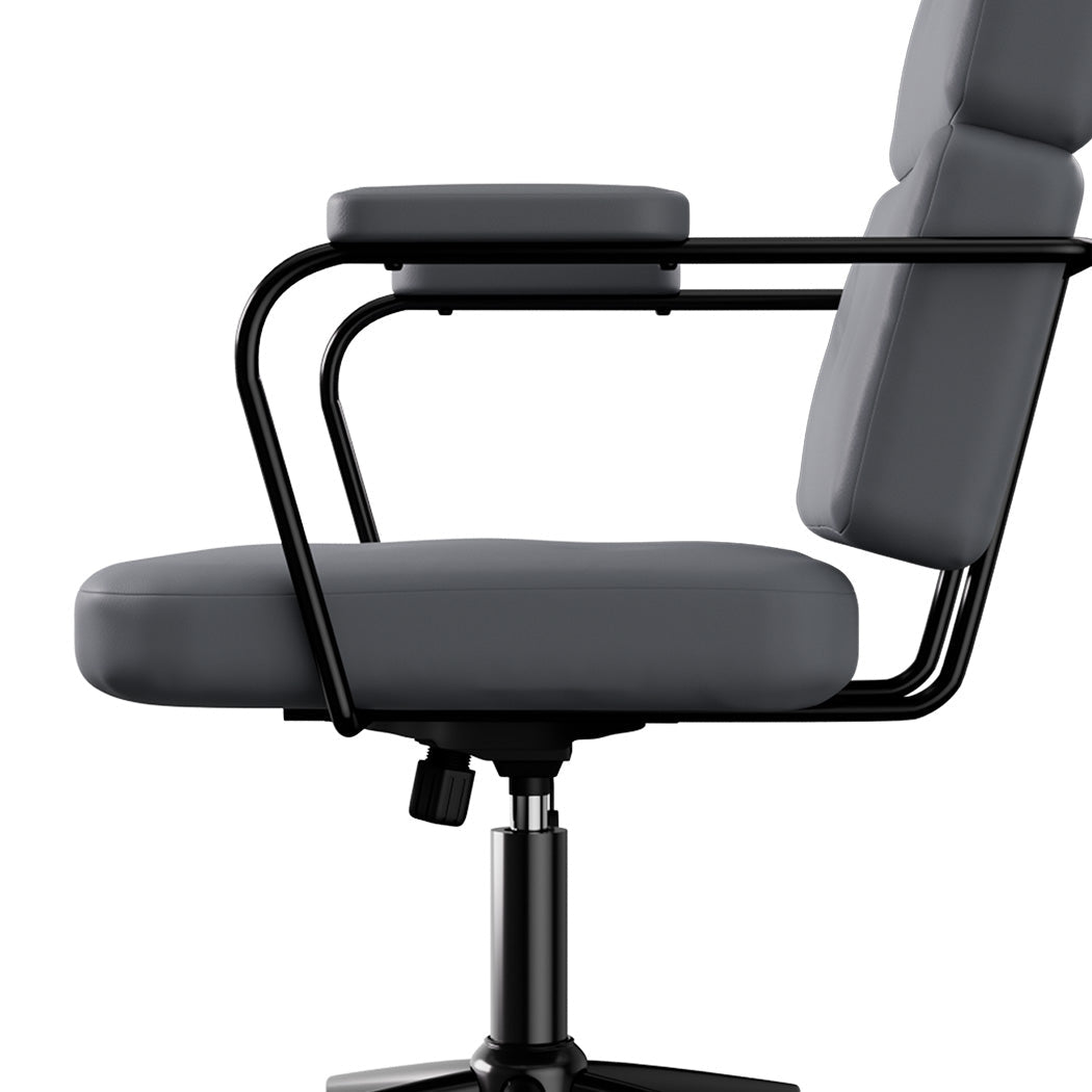 Grey ergonomic office chair in PU leather with adjustable high back and metal swivel base. — view 3
