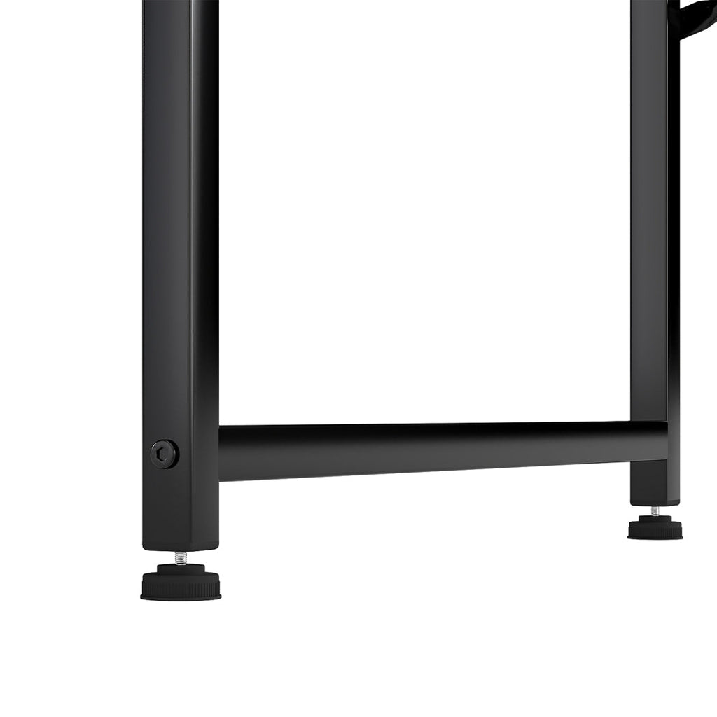 Black L-shaped gaming computer desk with steel frame and fabric storage bag for modern offices. — view 3