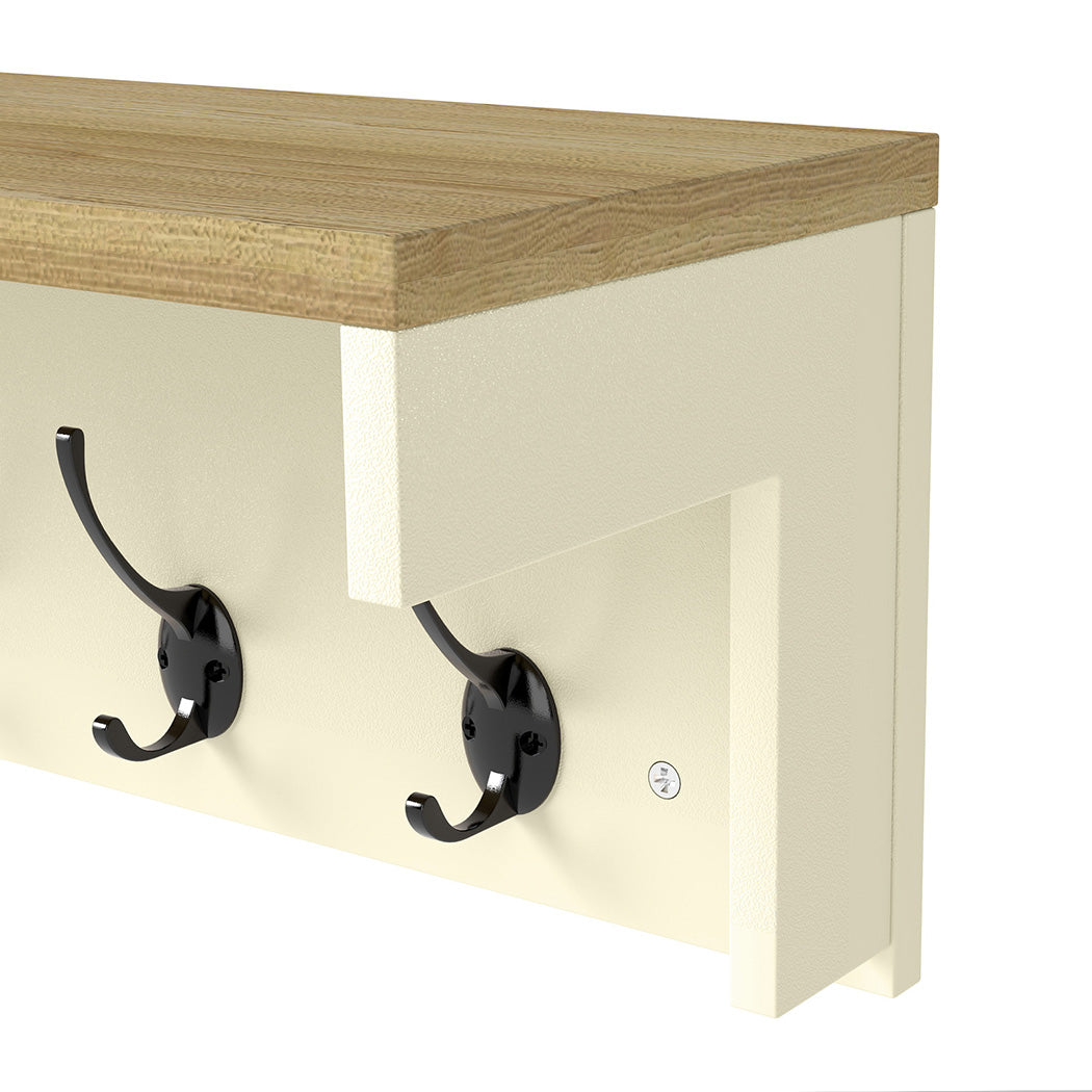 Cream wall mounted coat rack with natural oak top shelf and seven metal double hanging hooks — view 3