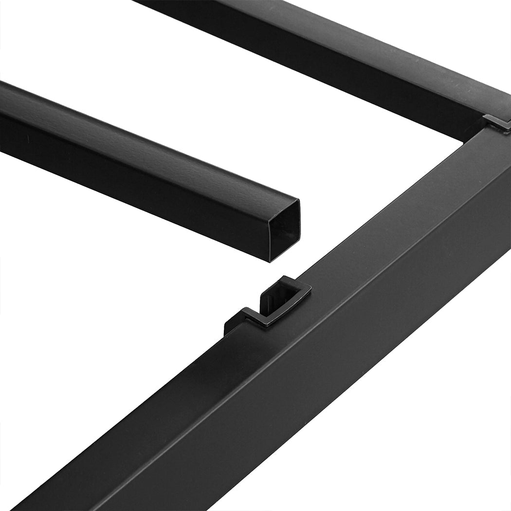 Black heavy duty metal platform bed frame with elevated under bed storage space and sturdy slats — view 4