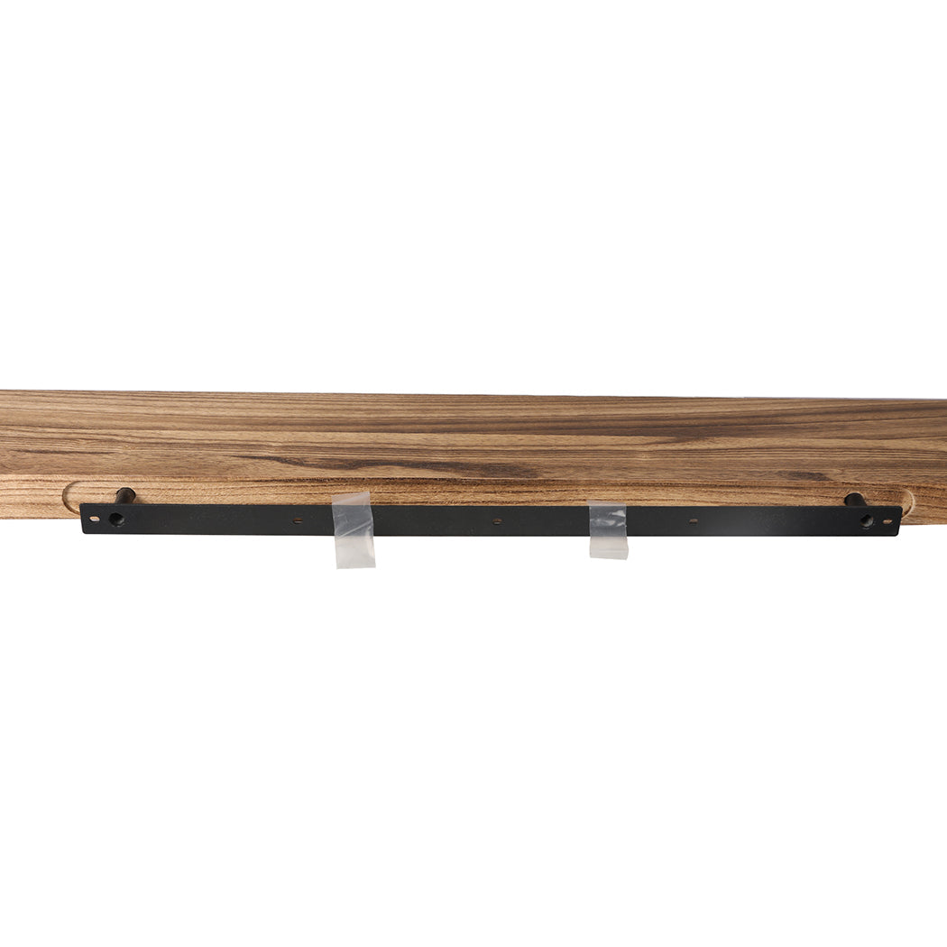 Two natural Paulownia wood floating shelves mounted on a wall displaying decorative living room items — view 4