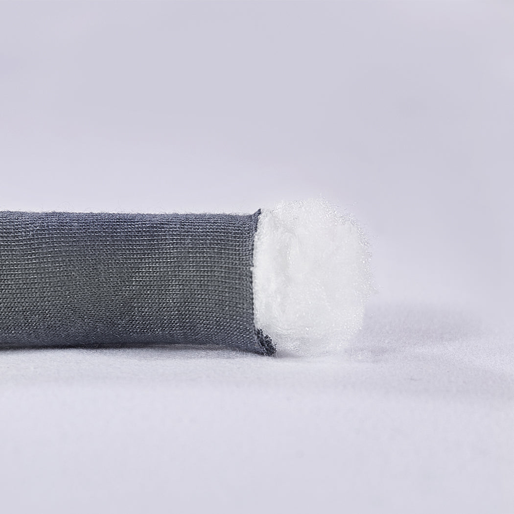 Chunky grey knitted weighted blanket folded neatly on a bed for anxiety relief and restful sleep — view 3