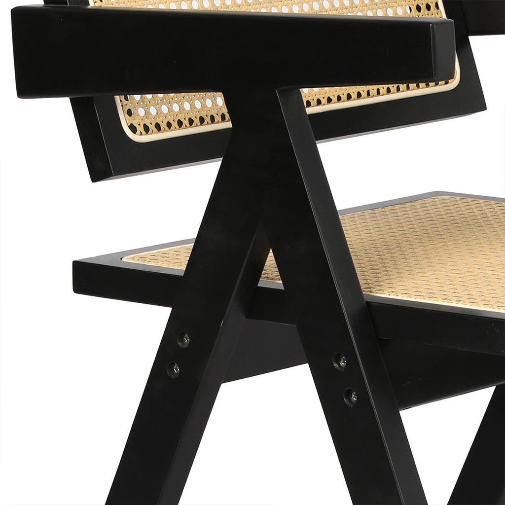 Black wicker rattan dining armchair with solid rubber wood frame and comfortable seat cushion. — view 5