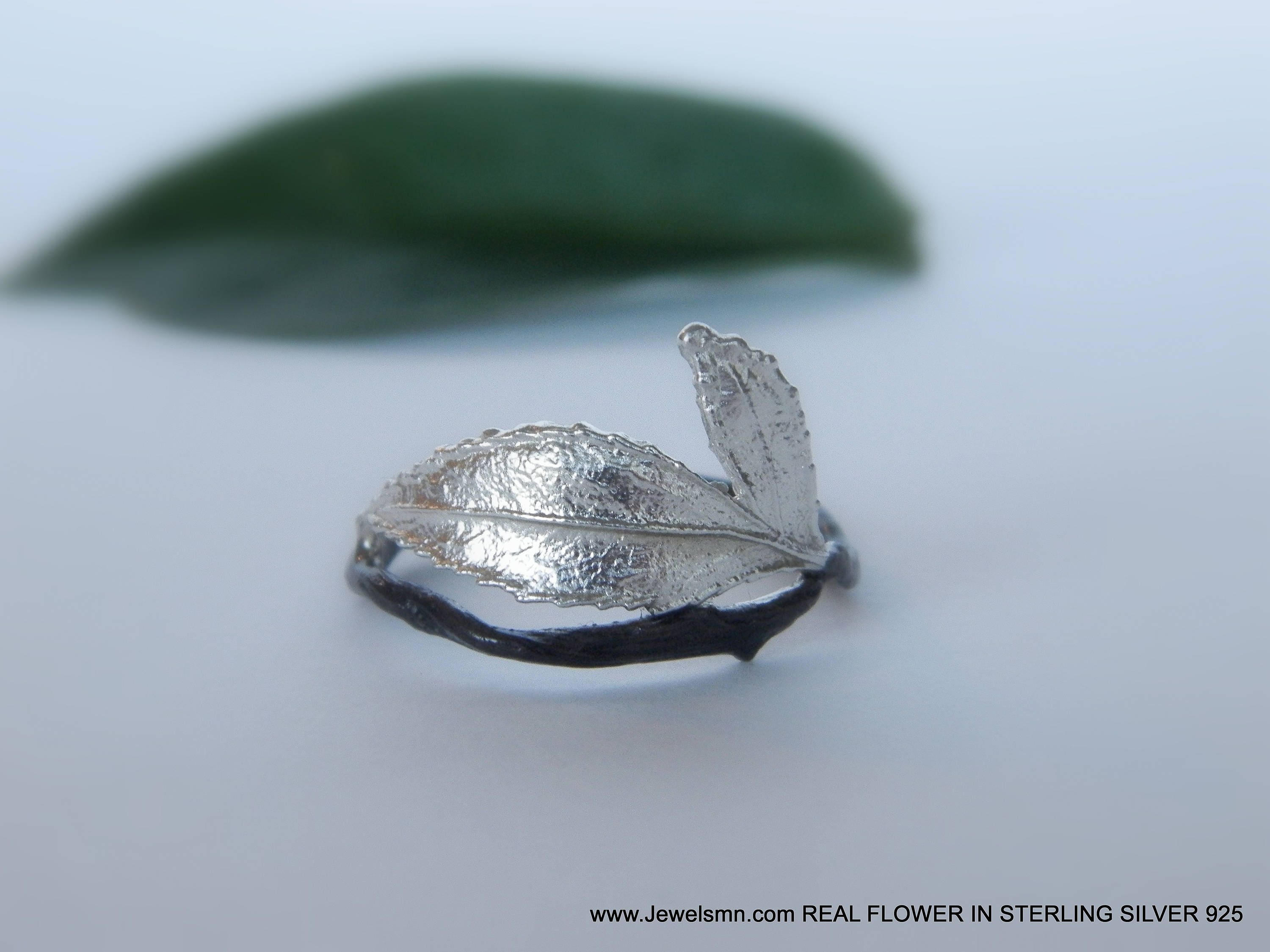 Gold and silver rose leaf ring crafted from real plant mold on a white background — view 5