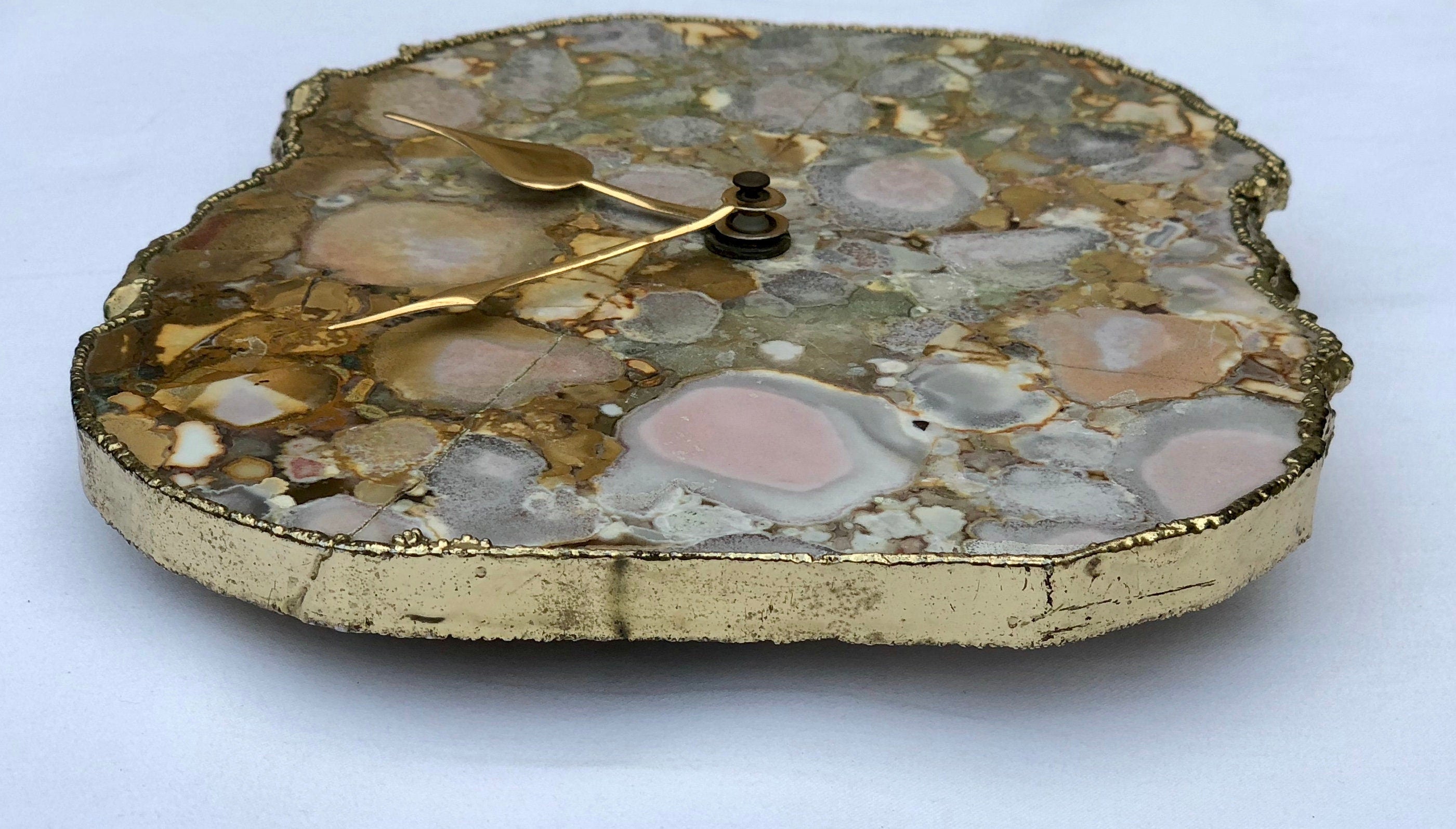 Conglomerate quartz desk clock with electroplated gold edges and brass hands on a metal base — view 2