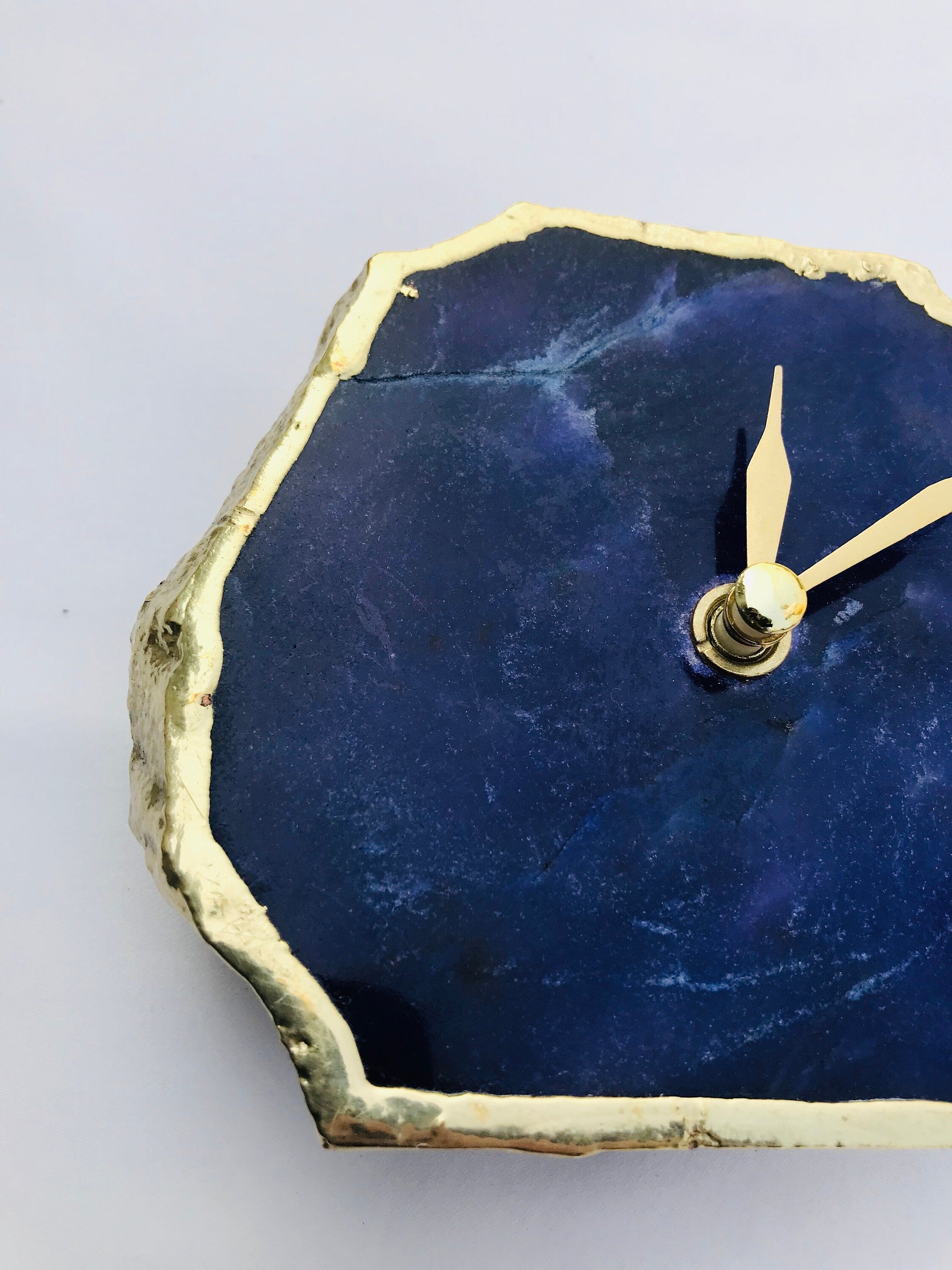 Indigo blue agate desk clock with metallic gold edges and modern brass hands on metal base — view 3