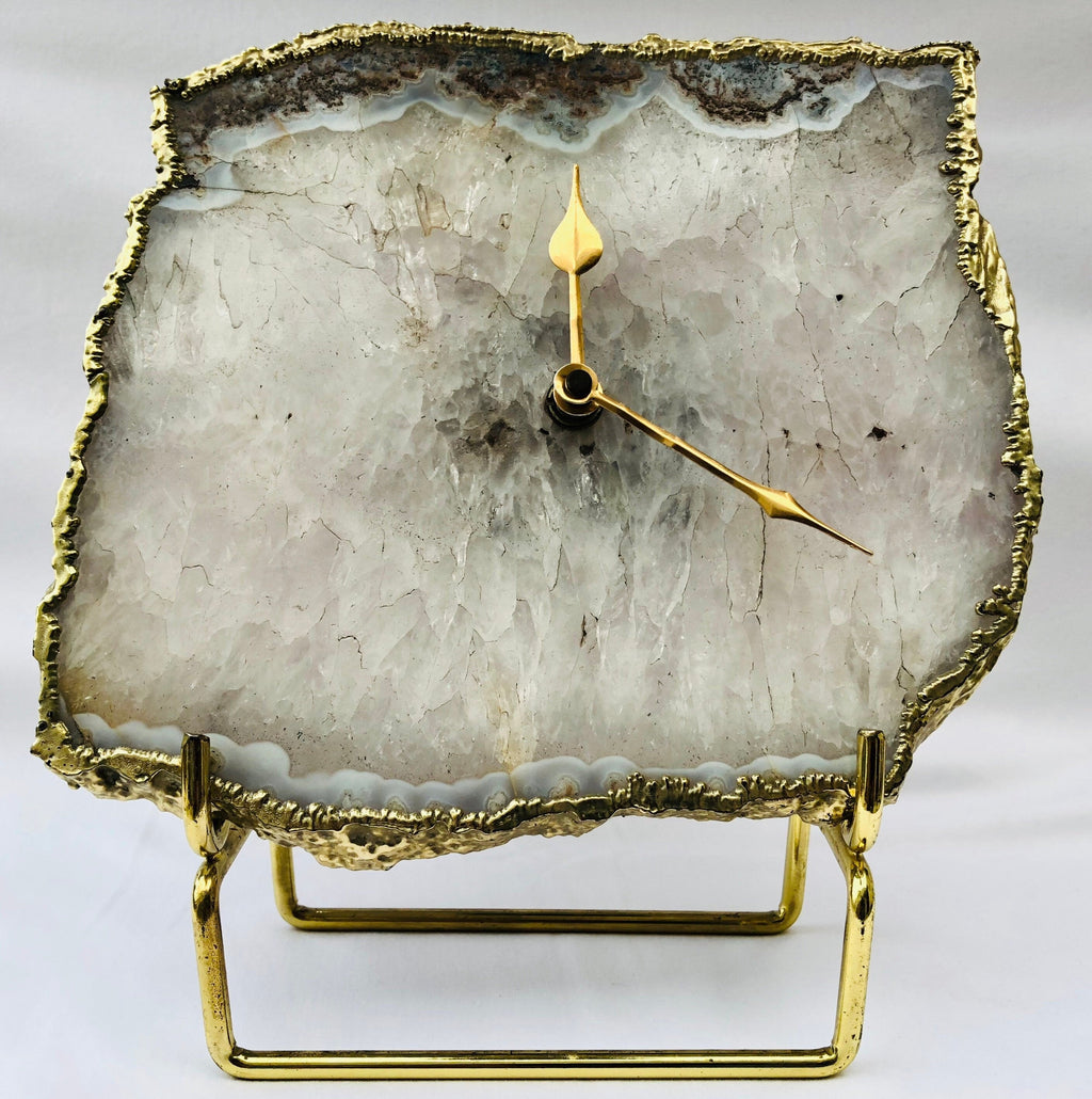 Grey agate wall and desk clock with gold electroplated edges and brass hands.