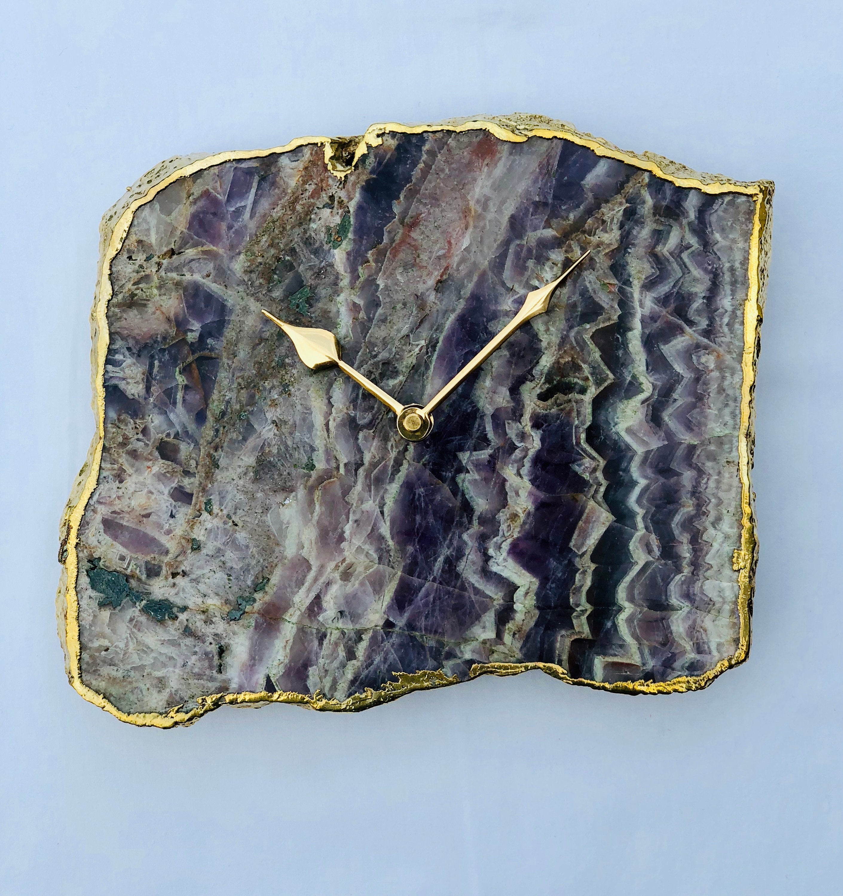 Irregular shaped natural purple amethyst quartz clock with gold electroplated edges and modern brass hands — view 2