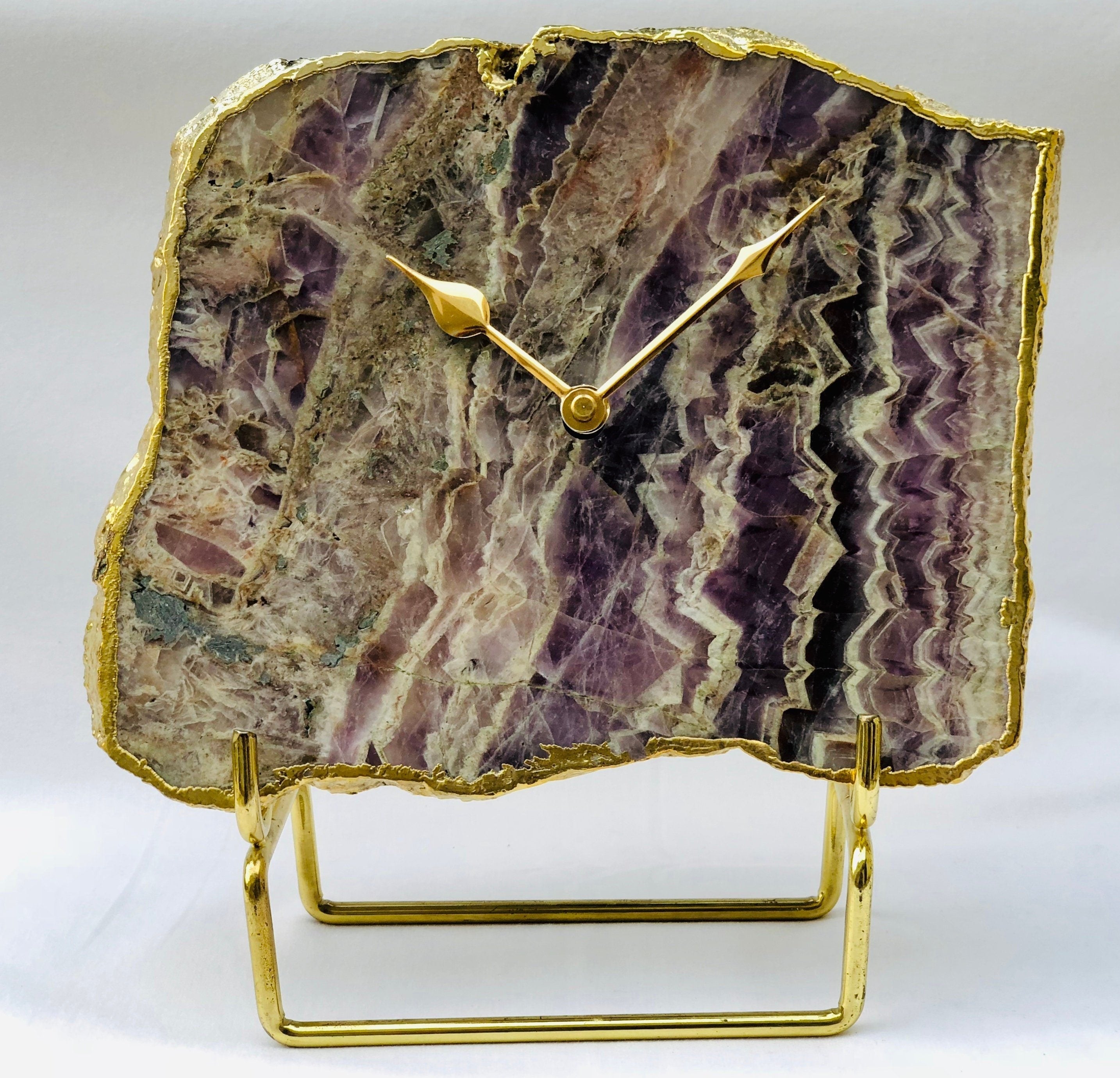 Irregular shaped natural purple amethyst quartz clock with gold electroplated edges and modern brass hands