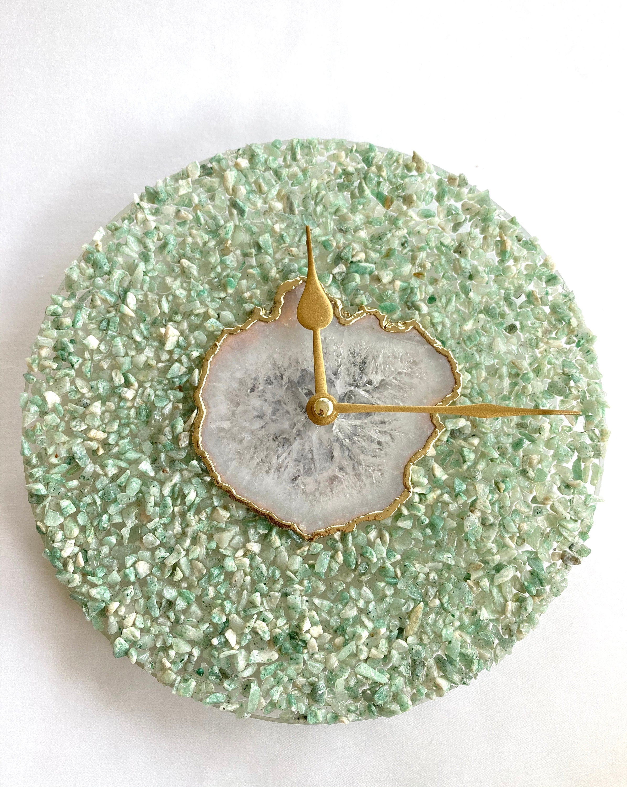 Green crystal and white agate 10-inch round wall clock with gold edges and brass hands