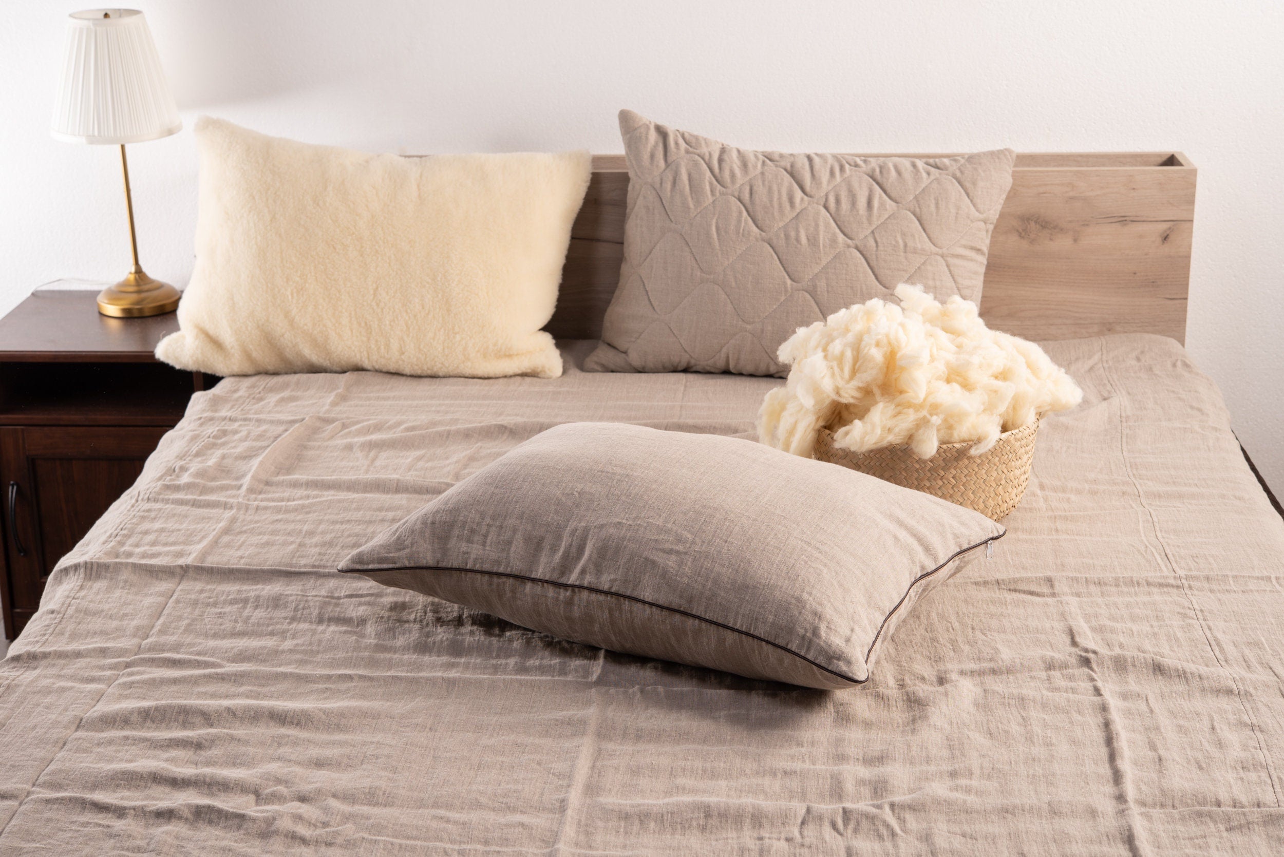 Natural linen bed pillow with premium merino wool filling and adjustable inner cotton casing — view 3