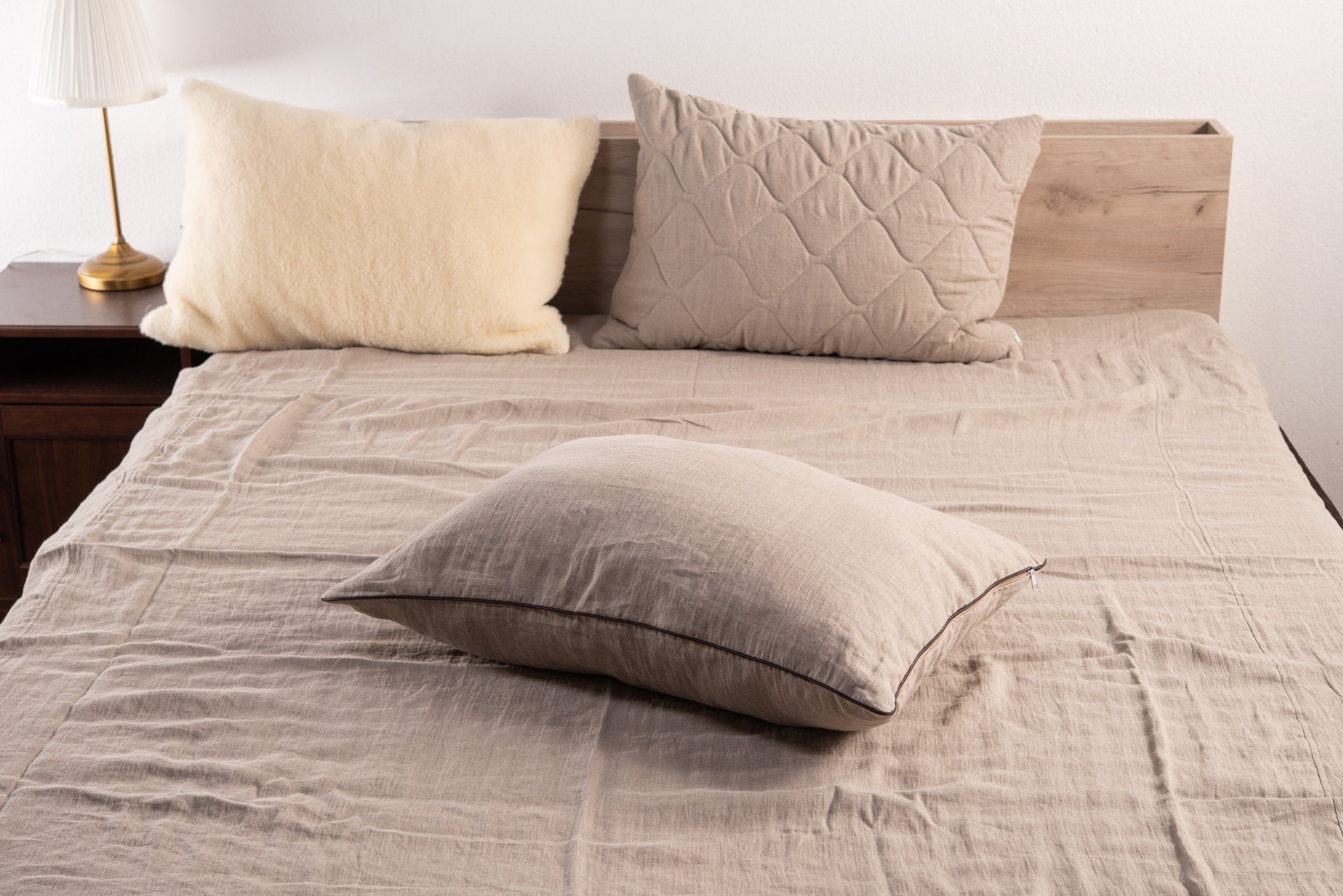 Natural linen bed pillow with premium merino wool filling and adjustable inner cotton casing — view 4