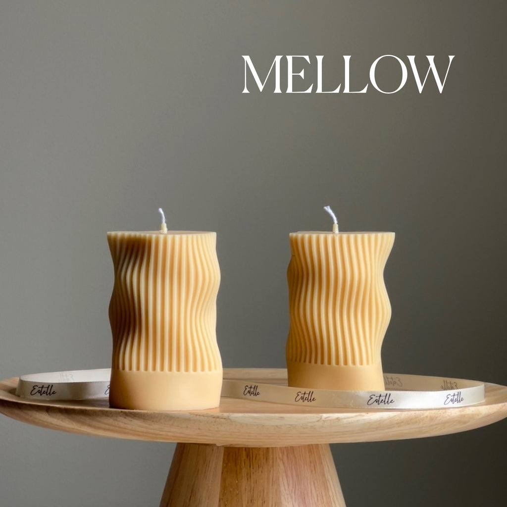 Handmade ribbed wave column soy candle in a minimalist living space setting — view 4