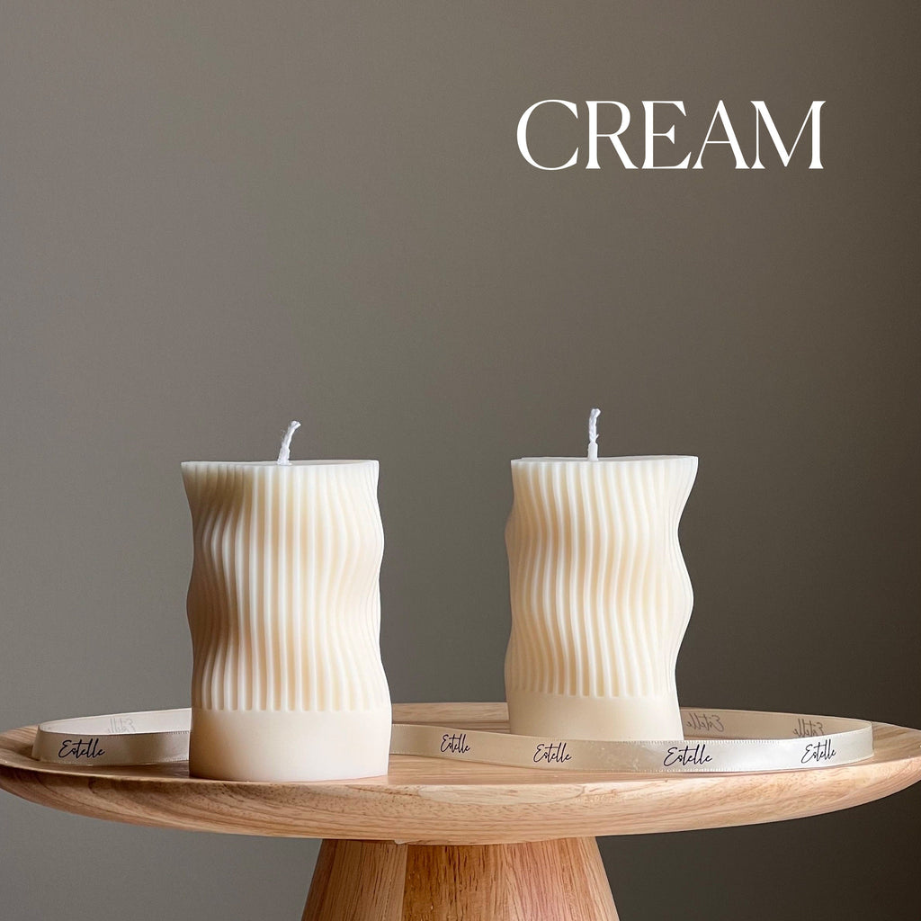 Handmade ribbed wave column soy candle in a minimalist living space setting — view 3
