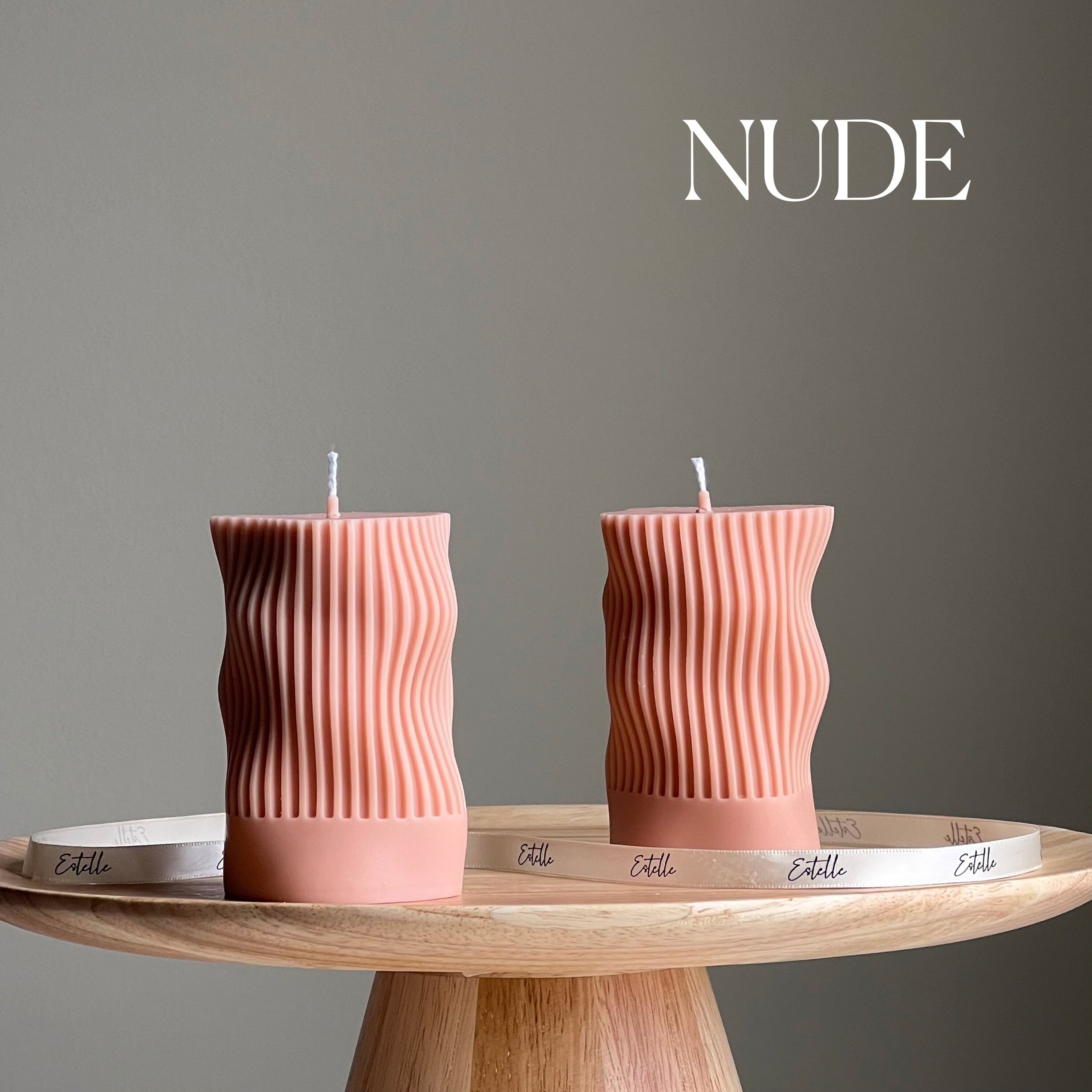 Handmade ribbed wave column soy candle in a minimalist living space setting — view 2