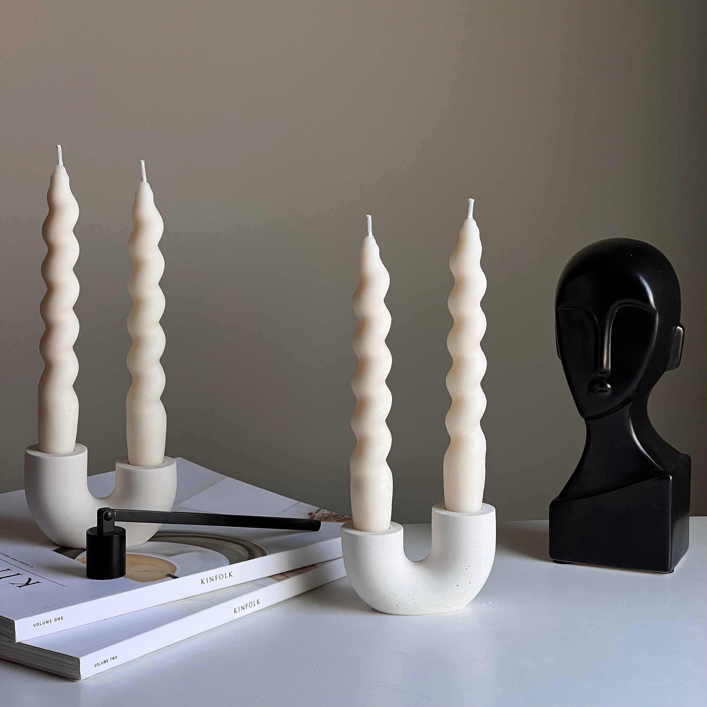 Minimalist handmade jesmonite double candlestick holder for taper candles on a modern dining table — view 2