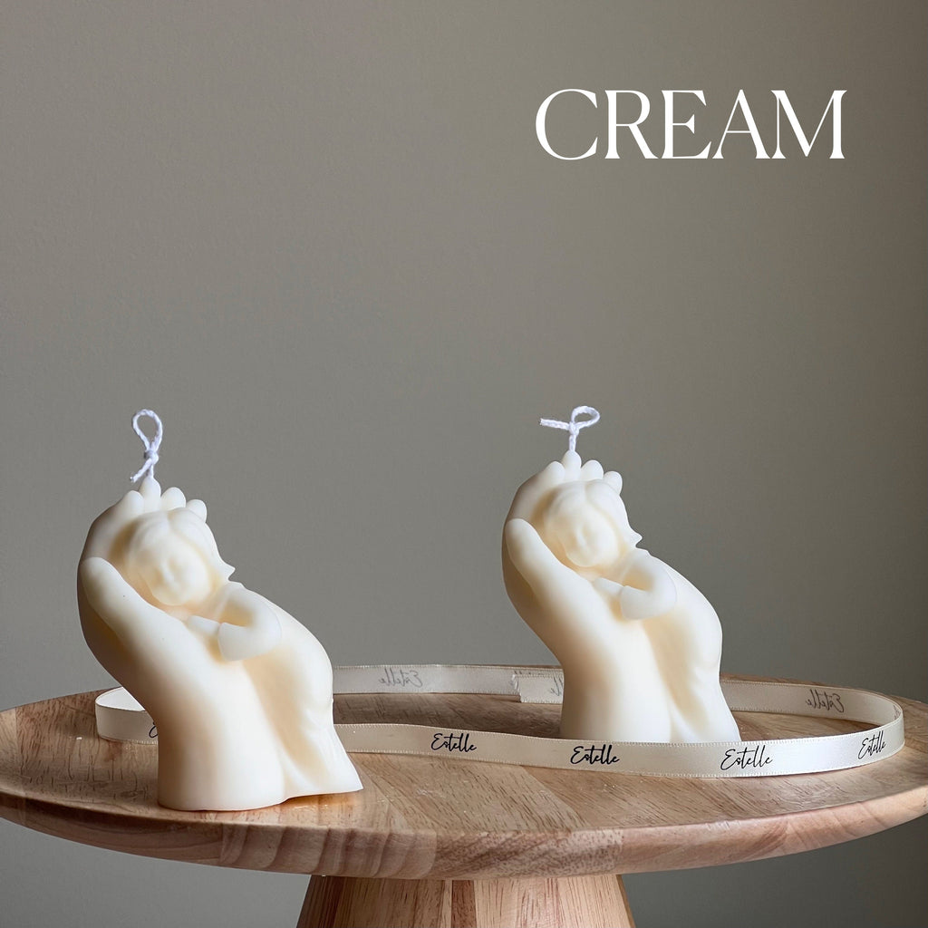 Handmade baby in hand sculptural soy wax candle in neutral tones for nursery room decor — view 3