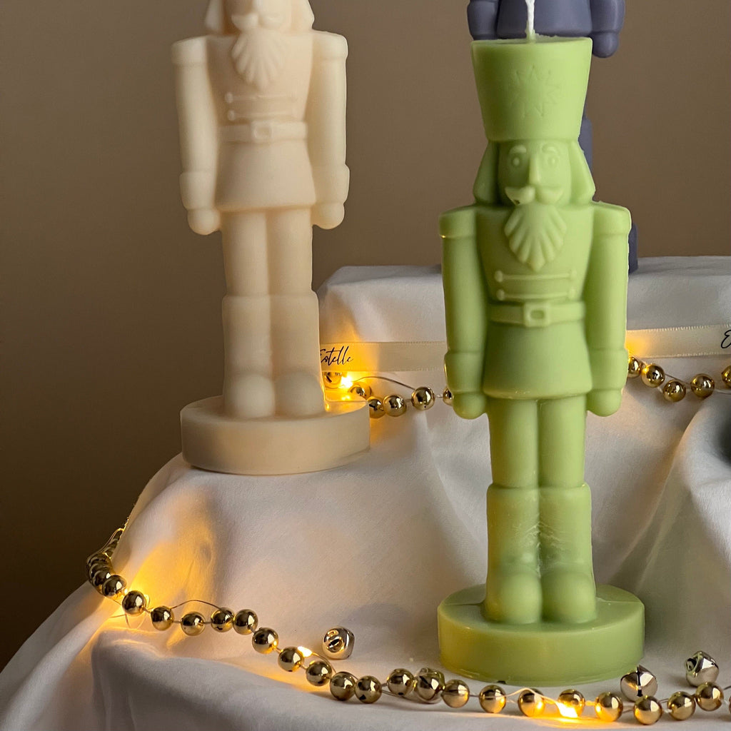 Handmade sculptural nutcracker candle made of solid soy wax for festive Christmas home decor displays — view 5