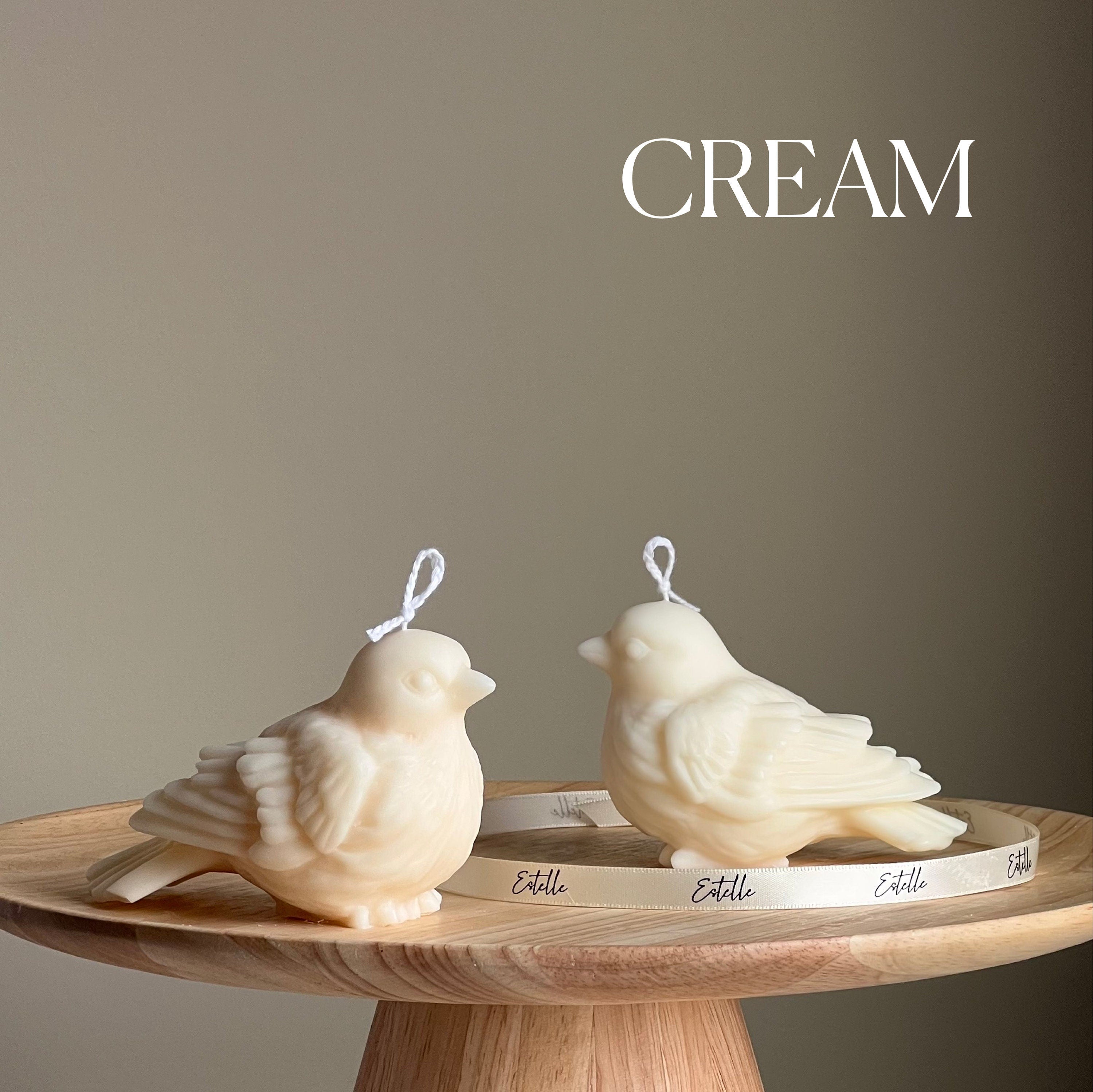 Handmade bird shaped soy wax decorative candle in a neutral pastel tone for home decor — view 3