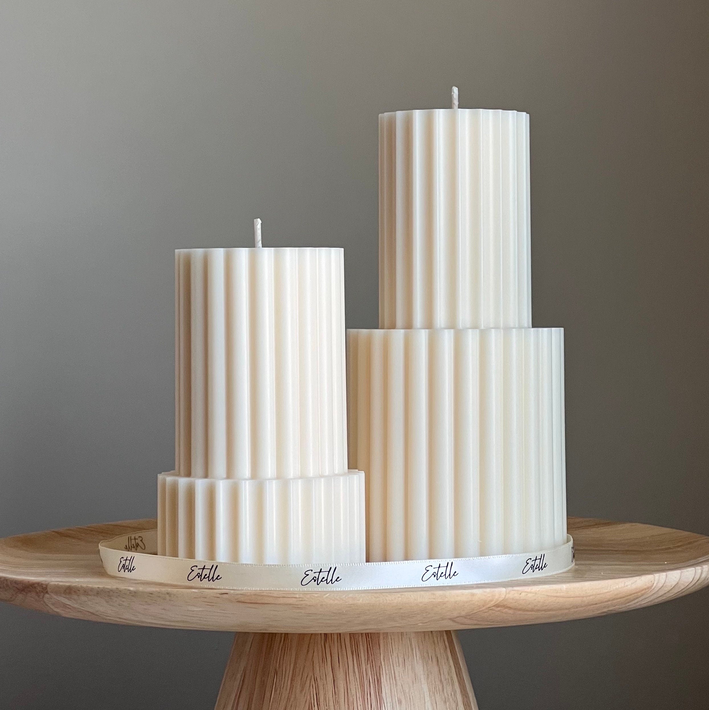 Handmade ribbed soy wax pillar candle in neutral tone for modern aesthetic home decor