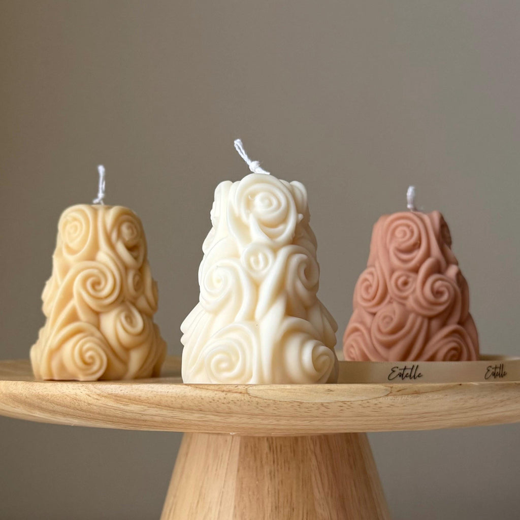 Handmade rose shaped sculptural soy candle in soft tones for elegant home decor and gifts