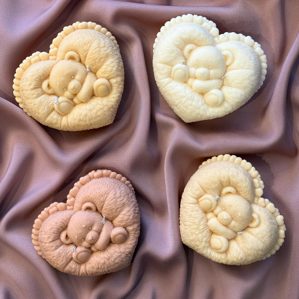 Handmade heart-shaped teddy bear soy candle in an unscented sculptural design for aesthetic home decor