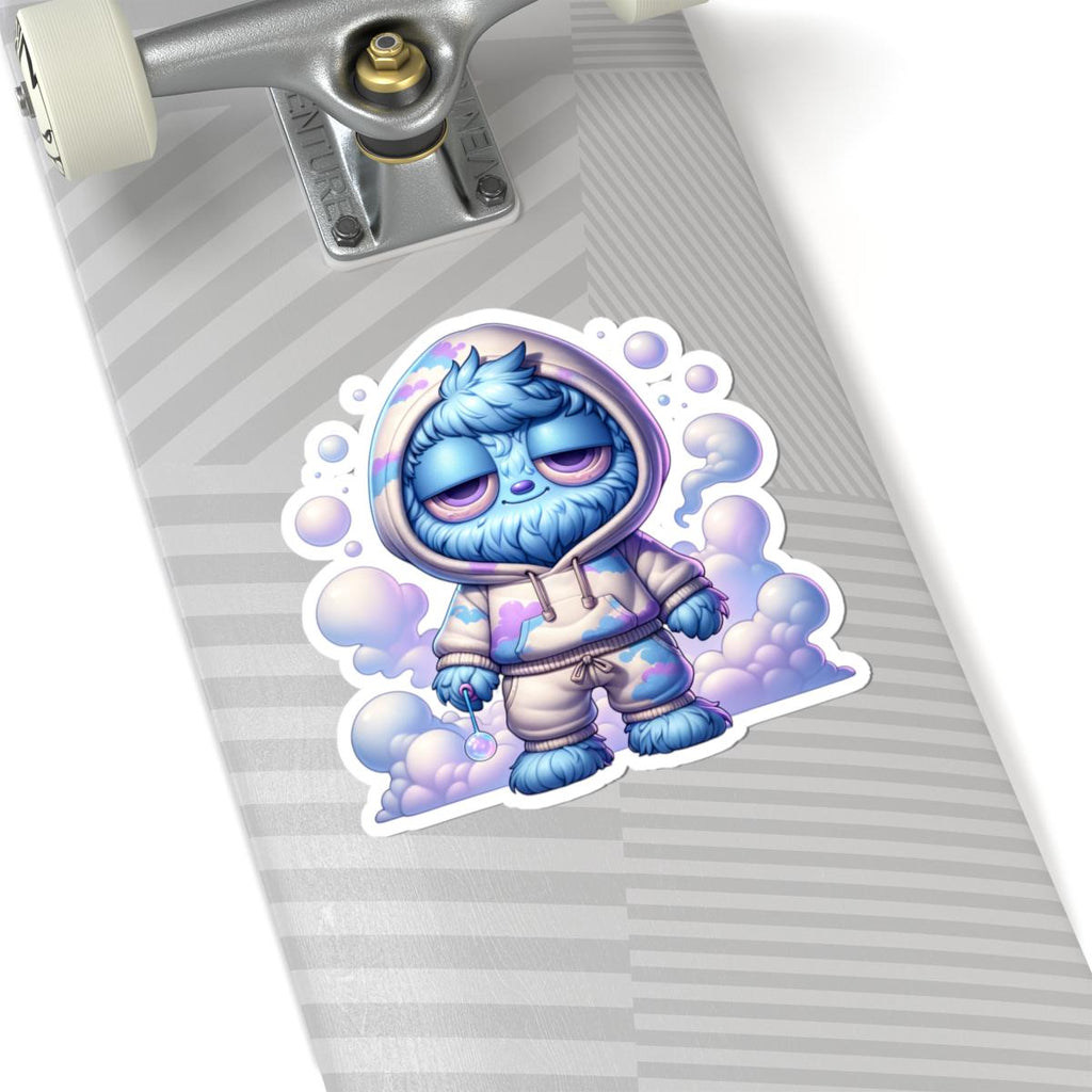 Glossy pastel vinyl sticker of a fluffy blue monster in a cloud hoodie holding an orb — view 2