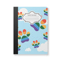 Rainbow paw print composition notebook with soft touch cover and vibrant cloud art pattern