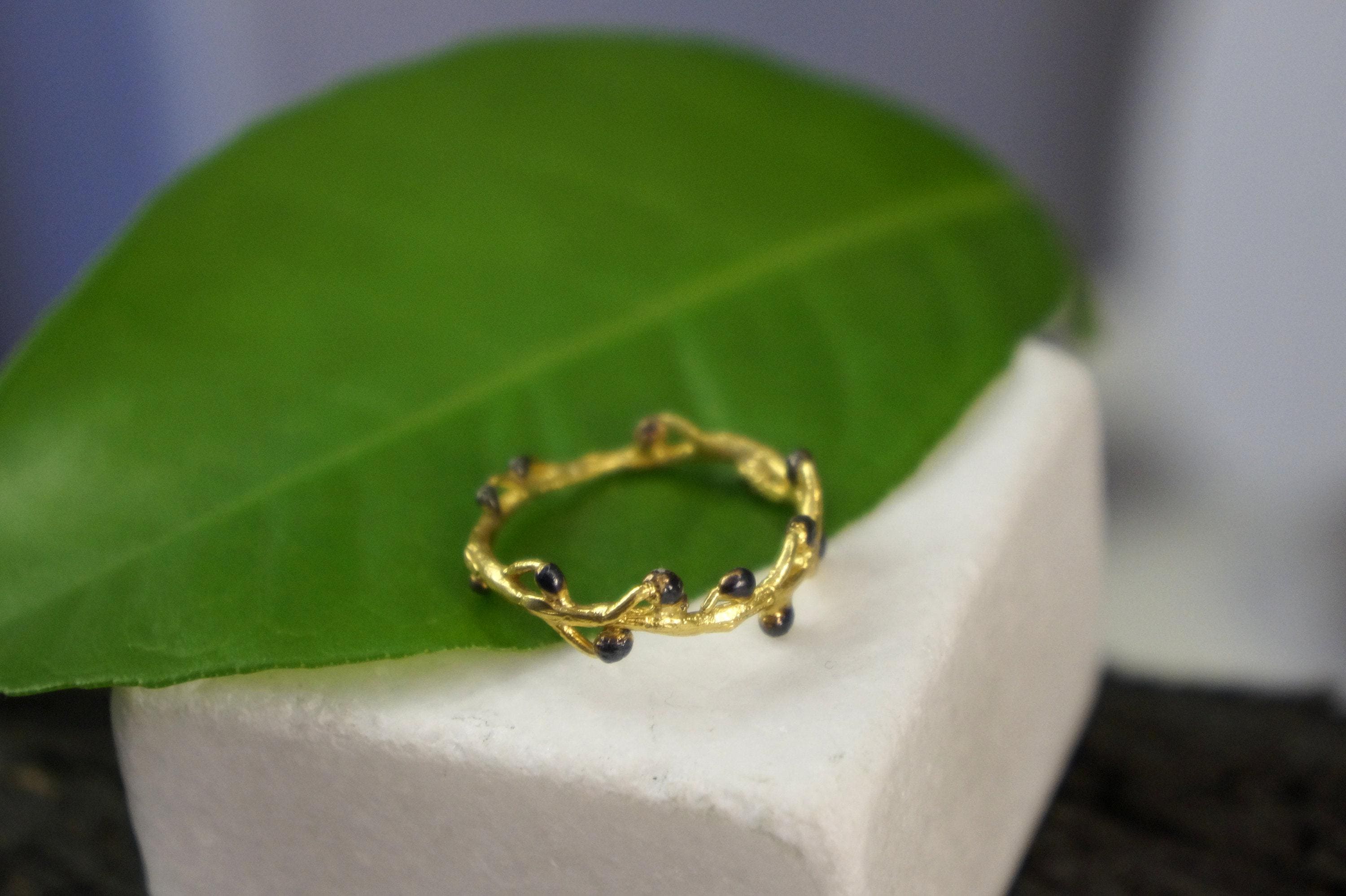 Handmade gold acacia ring crafted from recycled sterling silver featuring intricate botanical leaf vein details — view 5