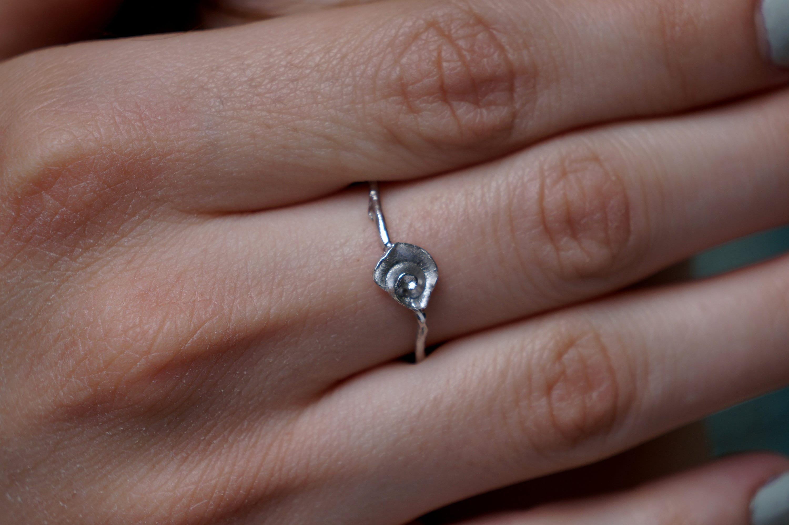 Minimalist sterling silver ring featuring an authentic embedded sea shell on a textured twig band — view 2