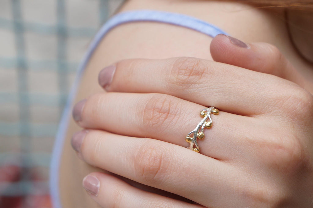 Handmade gold acacia ring crafted from recycled sterling silver featuring intricate botanical leaf vein details — view 3