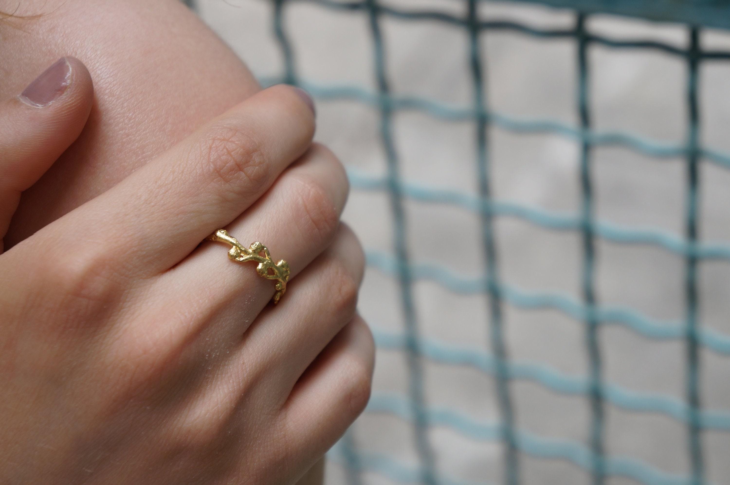 Handmade gold acacia ring crafted from recycled sterling silver featuring intricate botanical leaf vein details — view 4