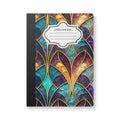 Art Deco composition notebook with vibrant jewel-toned geometric patterns and a soft touch cover