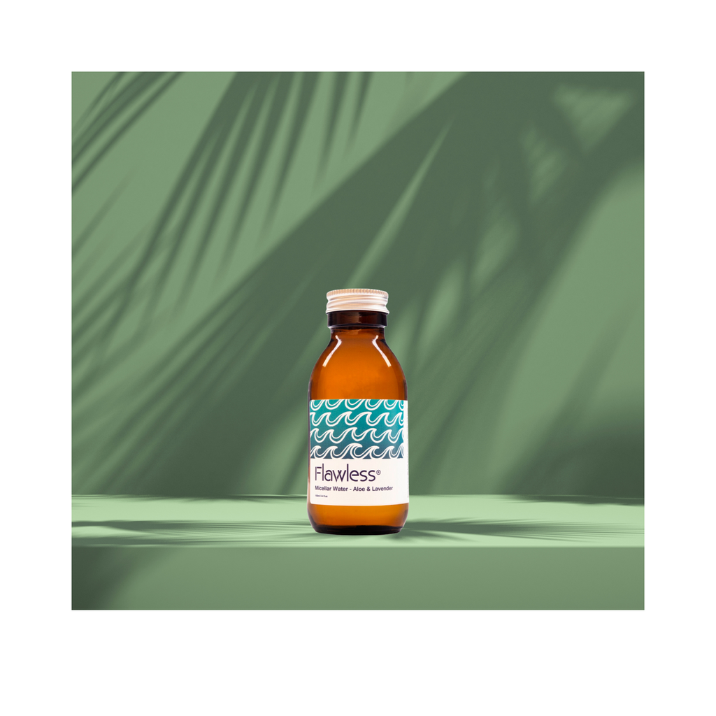 Micellar water in clear glass bottle with aluminum lid, infused with aloe vera and lavender — view 2