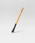 Angled blending bamboo makeup brush with soft vegan synthetic bristles and durable eco-friendly handle