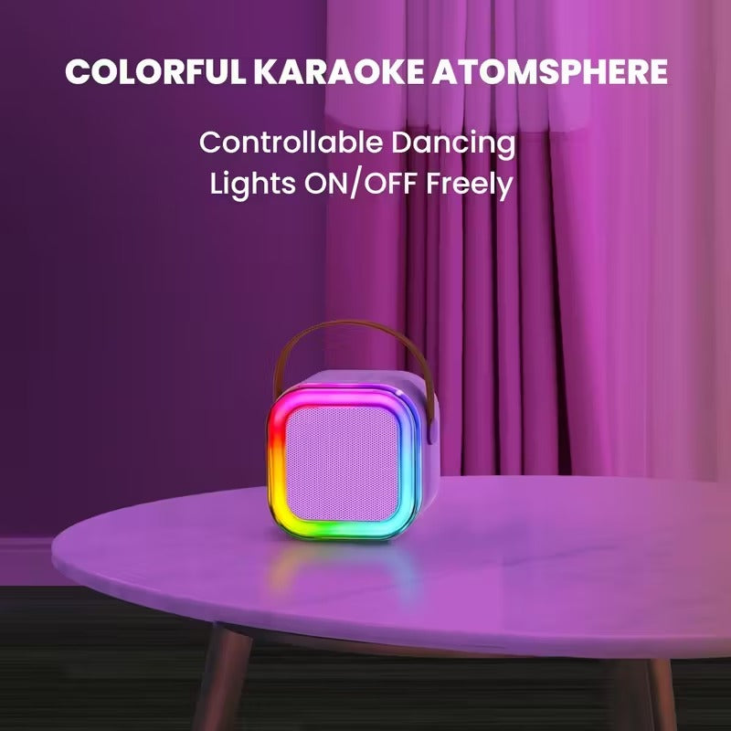 Wireless mini karaoke machine in purple with two matching cordless microphones for party entertainment — view 4
