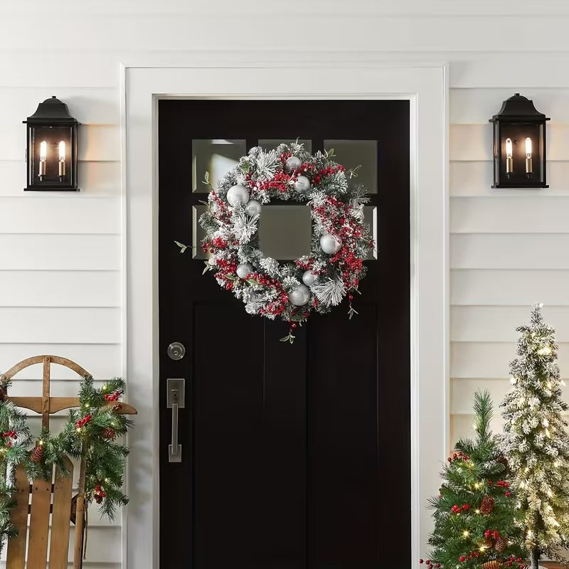 Artificial green Christmas wreath decorated with vibrant red berries and white balls for holiday doors — view 4