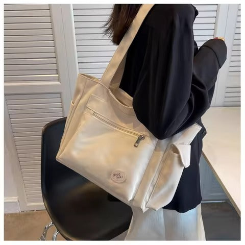 Beige waterproof Oxford tote bag with crossbody strap and exterior flap pocket — view 2