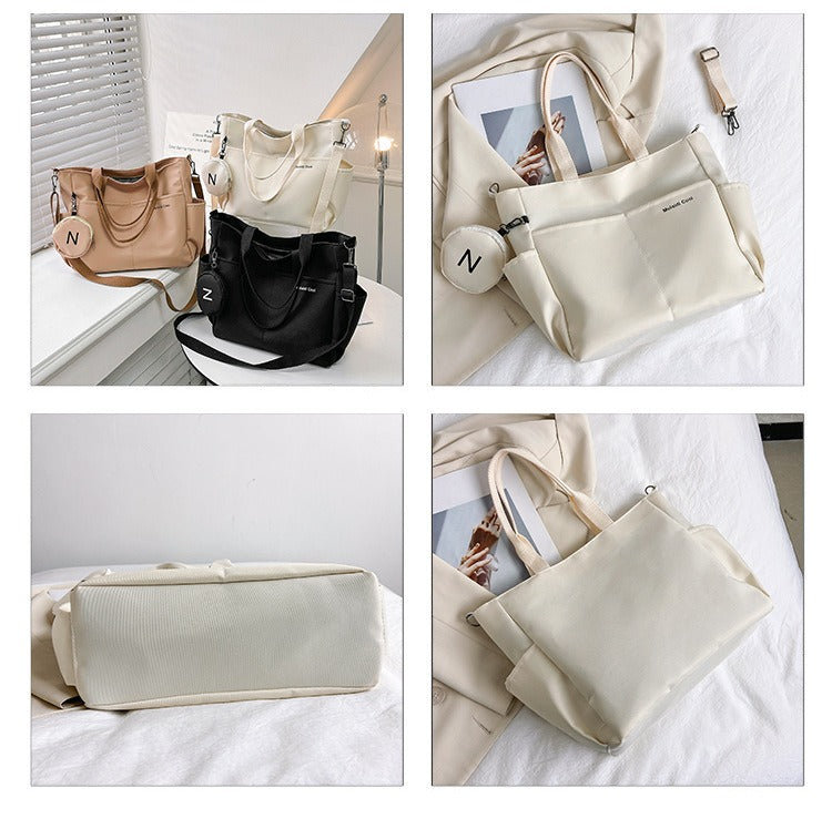 Beige waterproof Oxford tote bag with crossbody strap and exterior flap pocket — view 4