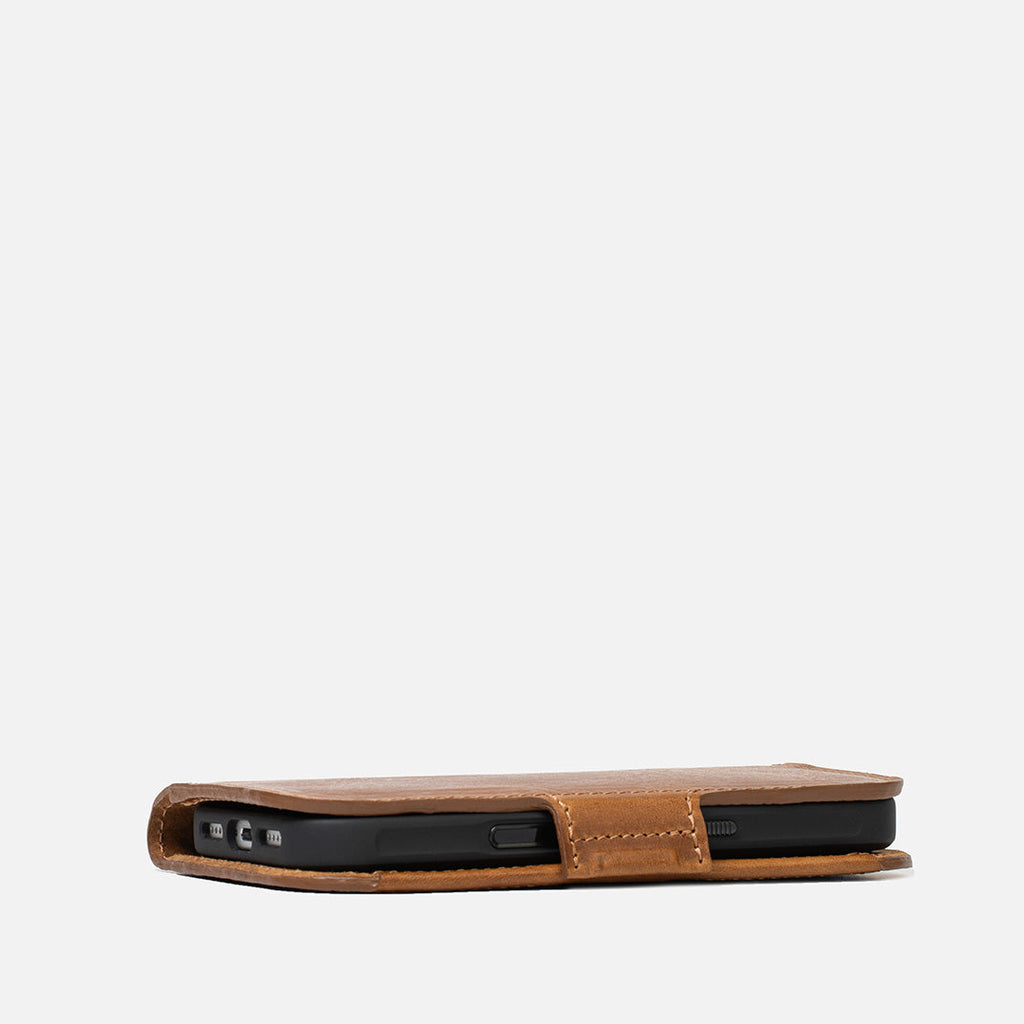 Full grain Italian leather MagSafe folio case for iPhone 17 featuring a minimalist wallet interior — view 5
