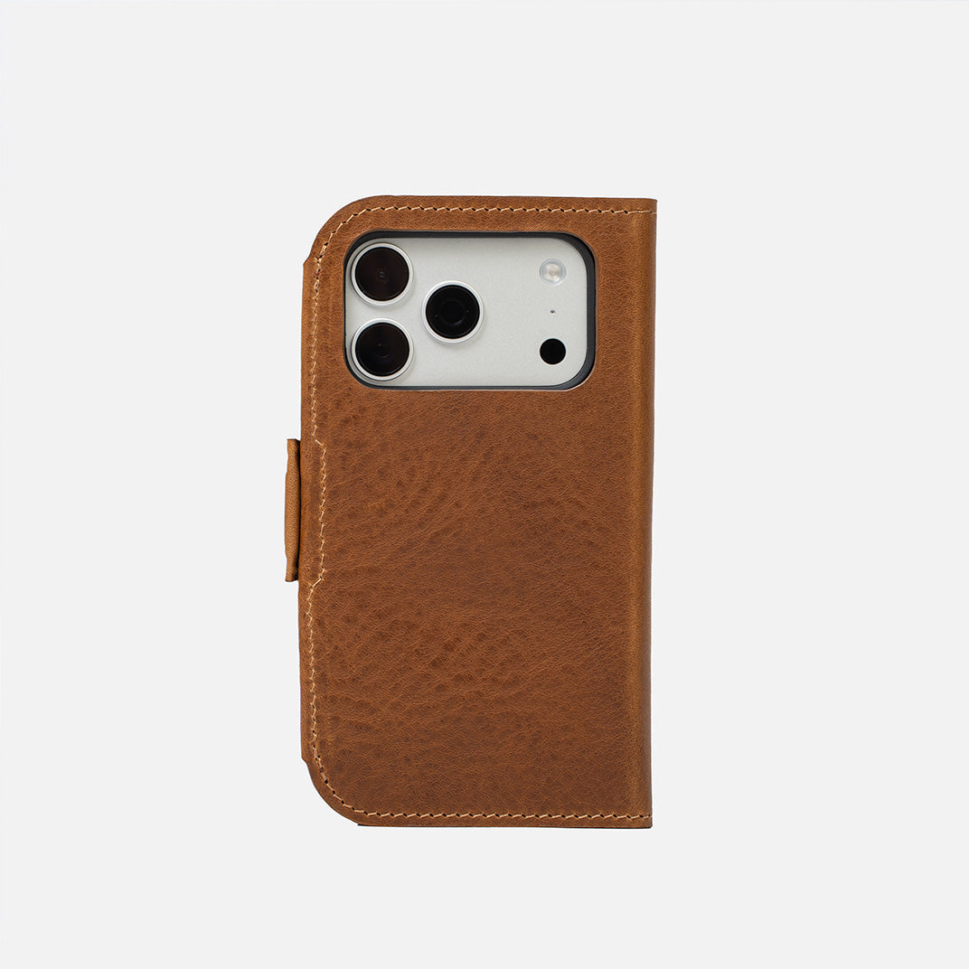 Full grain Italian leather MagSafe folio case for iPhone 17 featuring a minimalist wallet interior