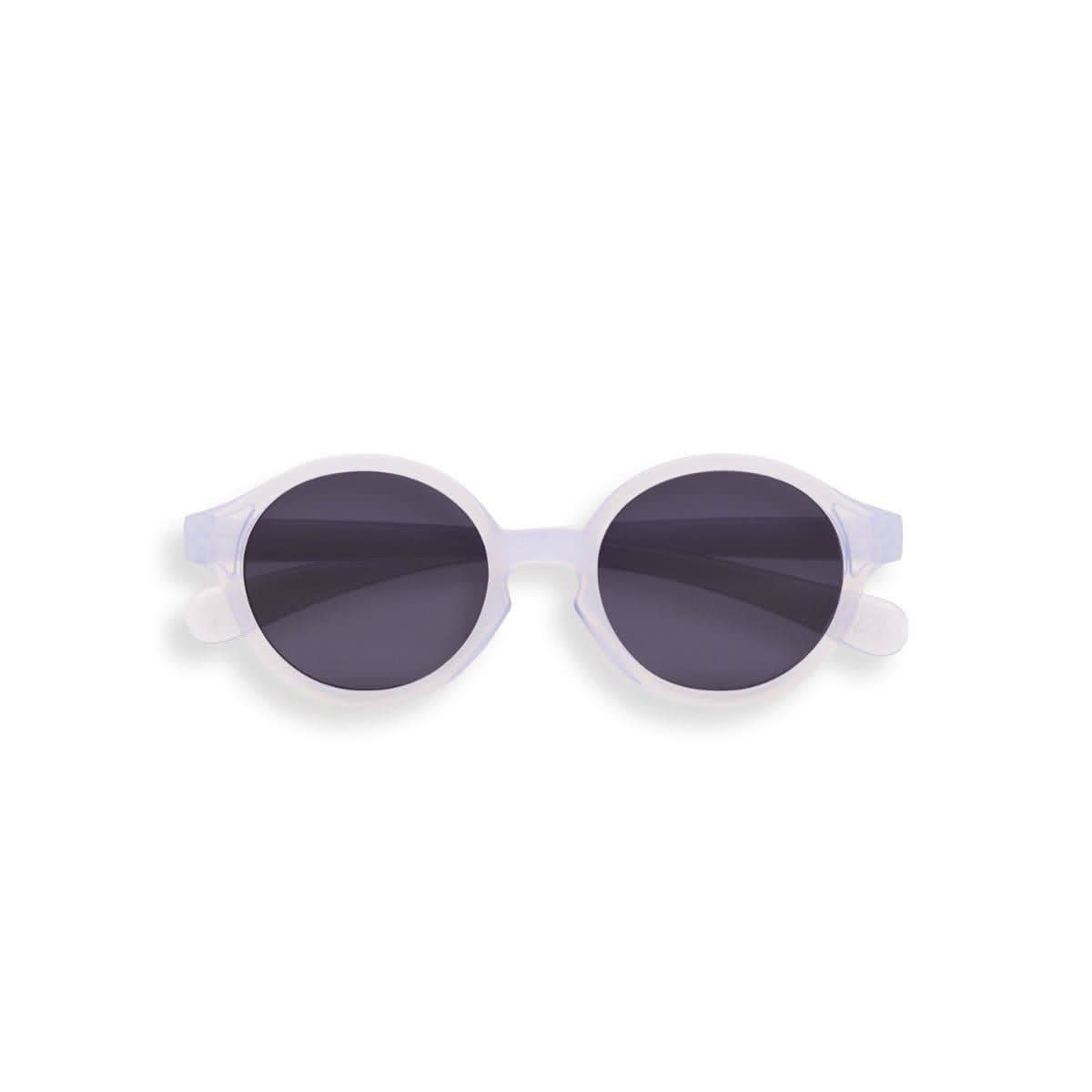 Translucent Morning Light baby sunglasses with flexible frame and silicone head strap on white background