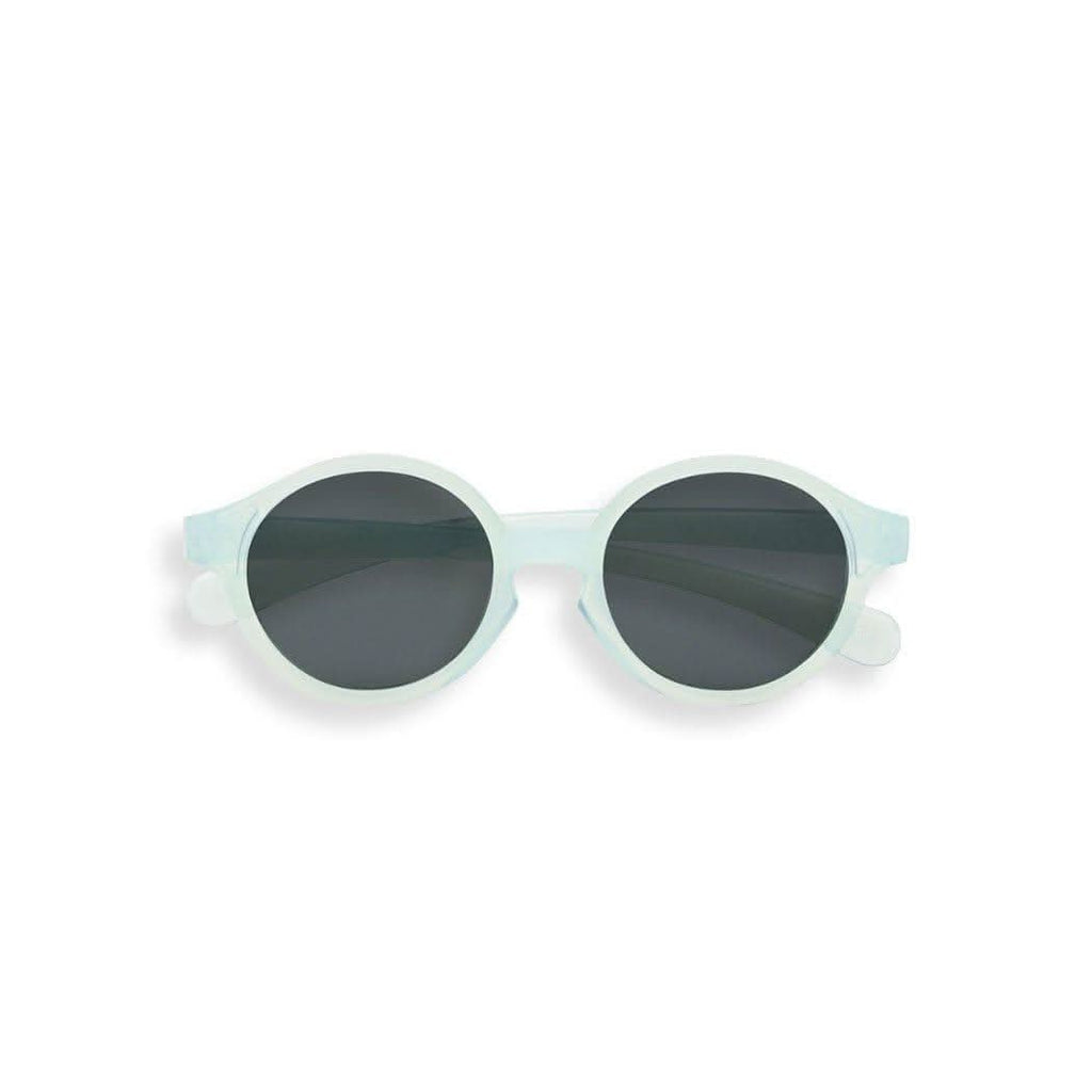 Translucent Morning Light baby sunglasses with flexible frame and silicone head strap on white background — view 3