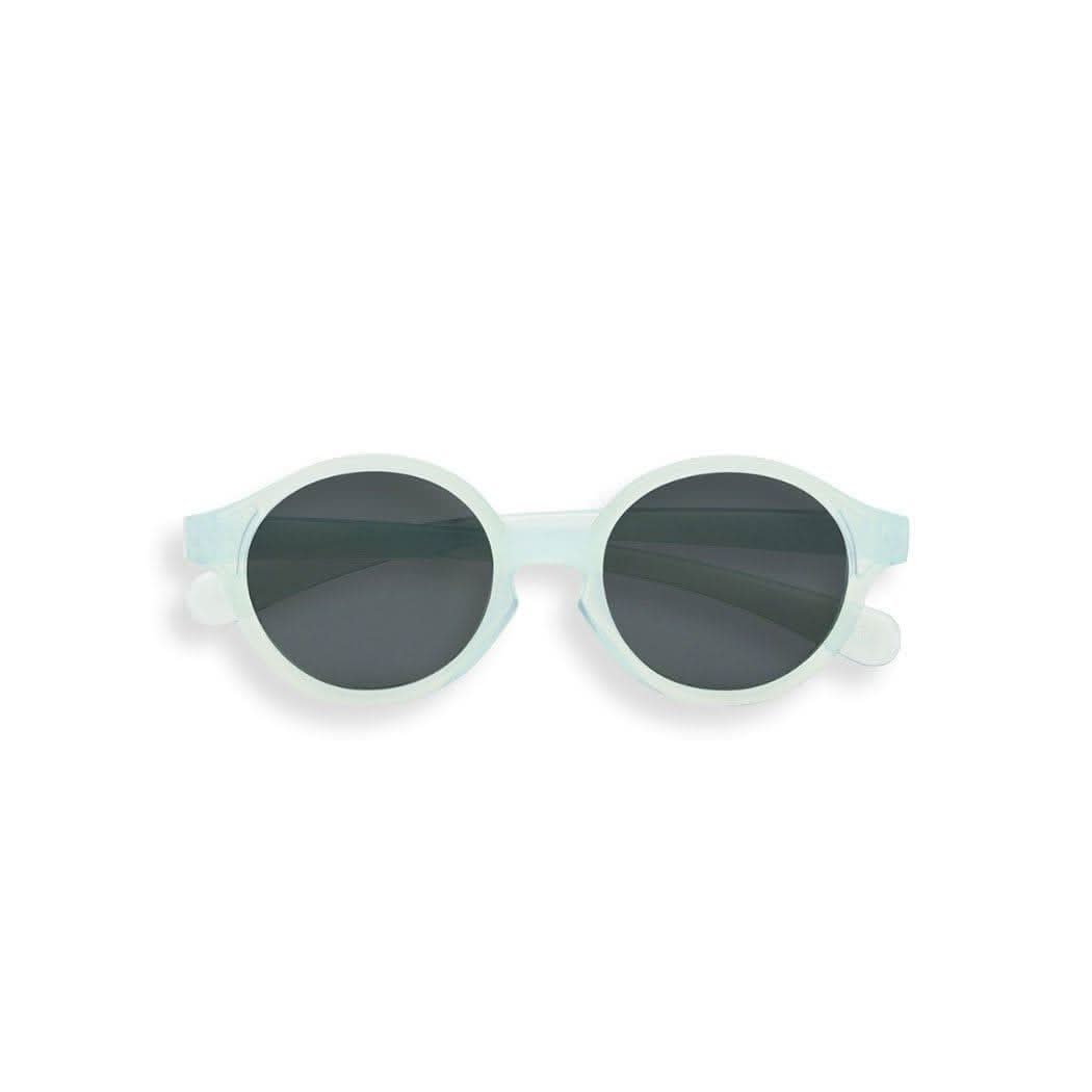 Translucent Morning Light baby sunglasses with flexible frame and silicone head strap on white background — view 3