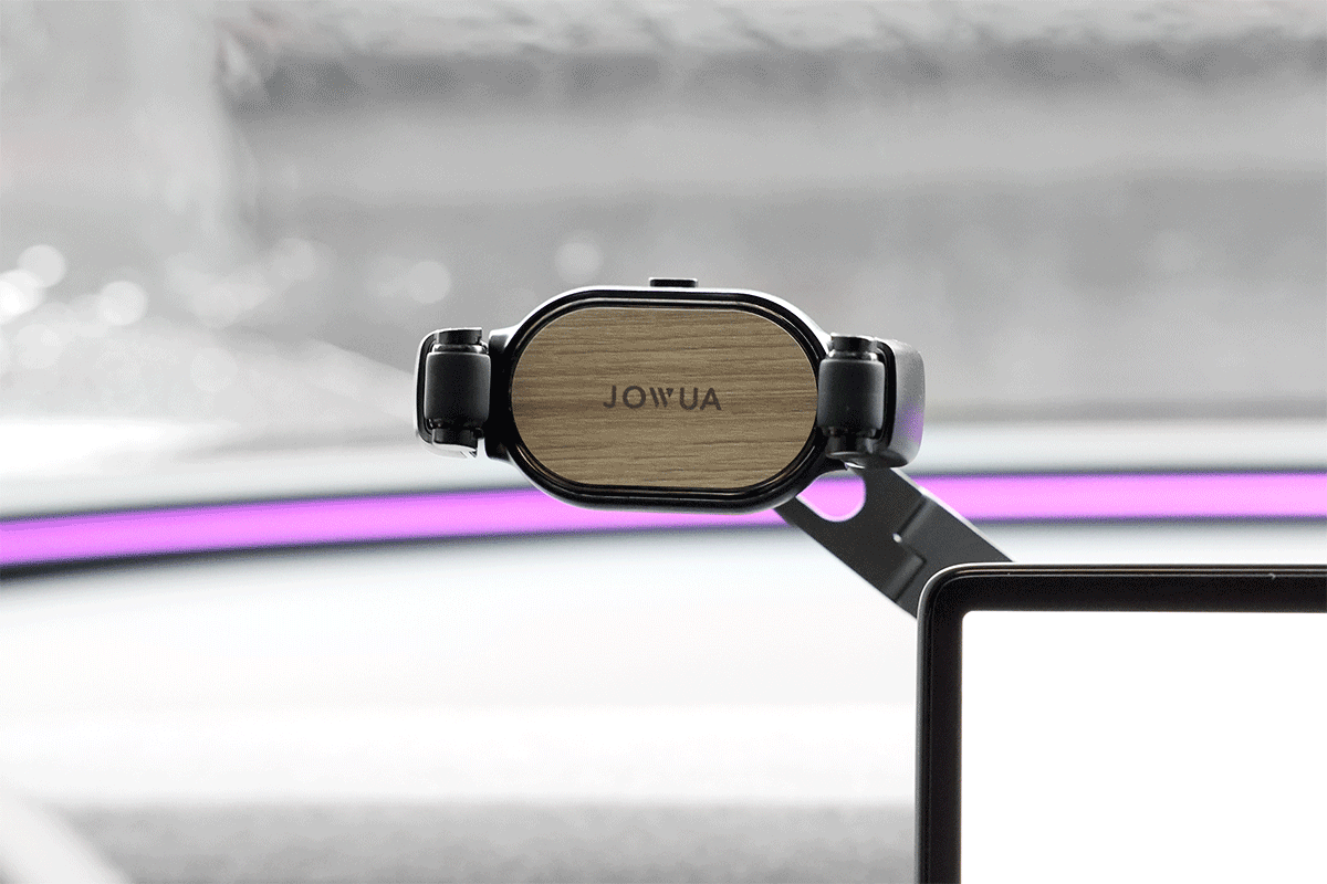 Retractable foldaway car mount with adjustable metal arm and silicone clamp holding a smartphone — view 3