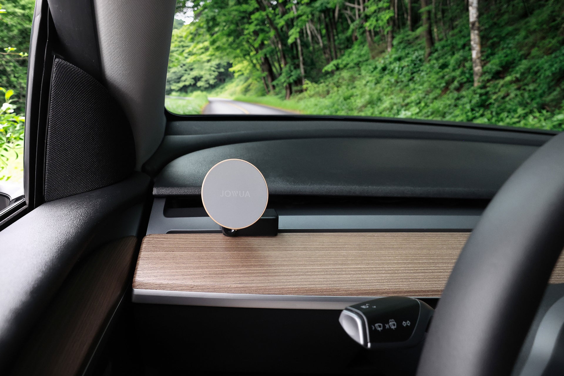 Active cooling MagSafe wireless car mount with vent clip attached to a Tesla dashboard — view 3