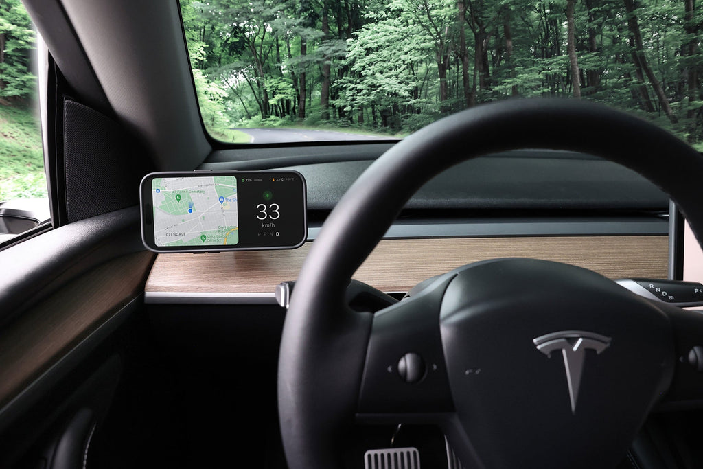 Active cooling MagSafe wireless car mount with vent clip attached to a Tesla dashboard — view 5